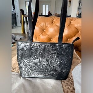 Hand tooled leather shoulder purse